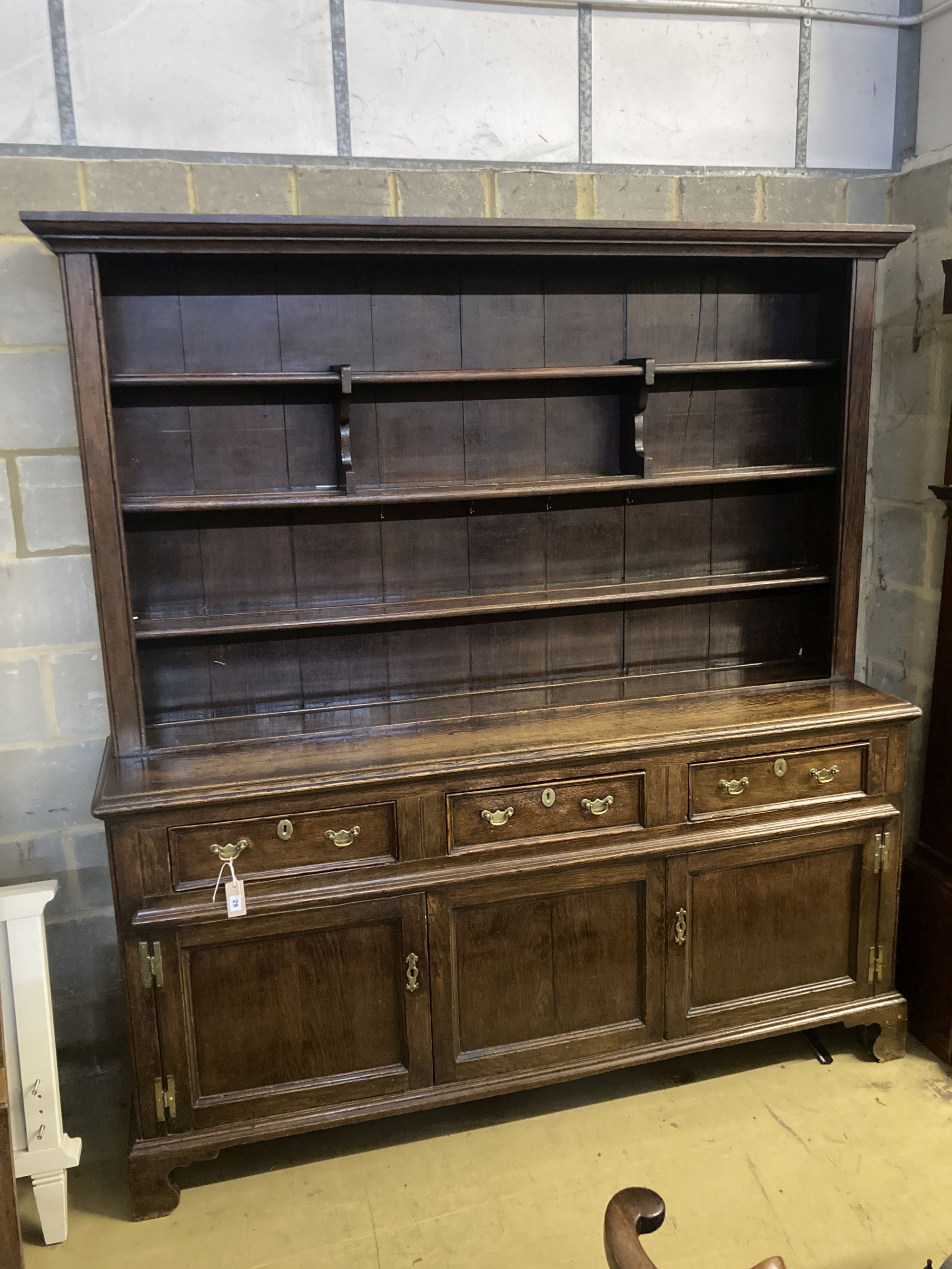 A George III oak and pine dresser, width 188cm depth 50cm height 204cm